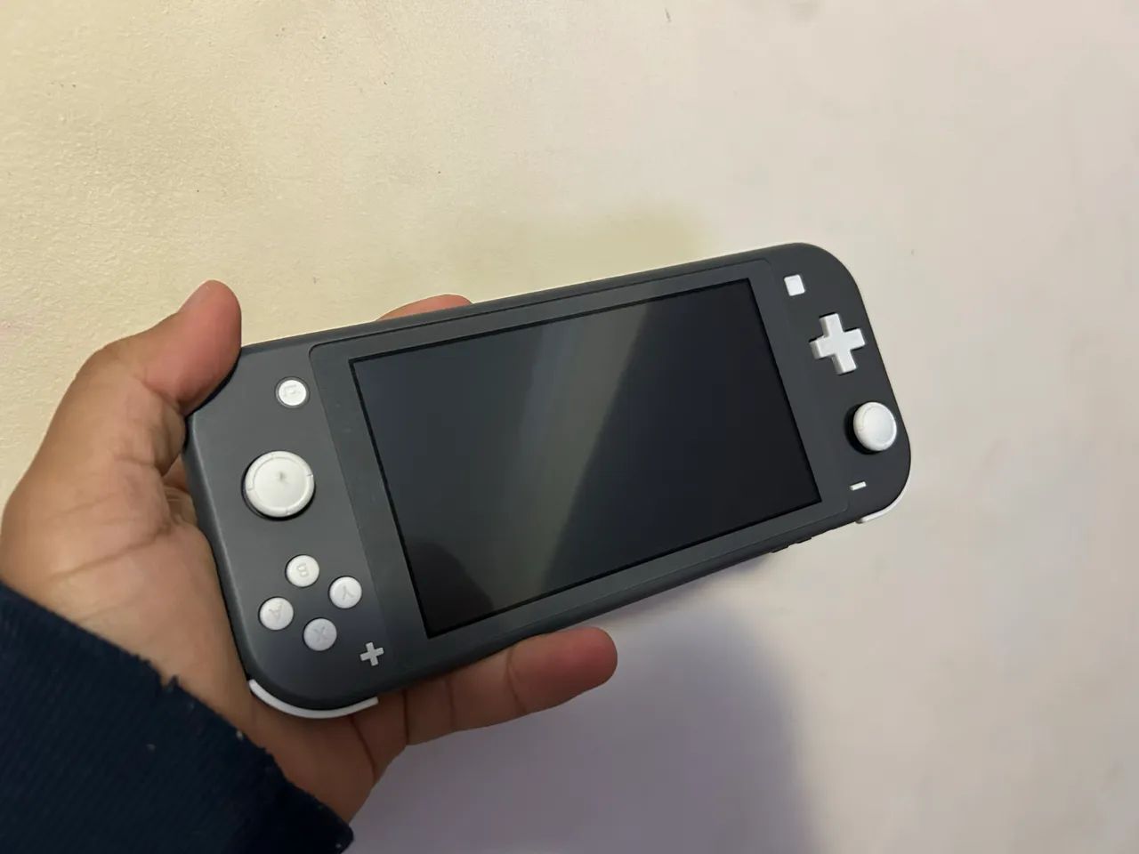 Nintendo Switch Lite com jogo New Super Mario Bros U Deluxe