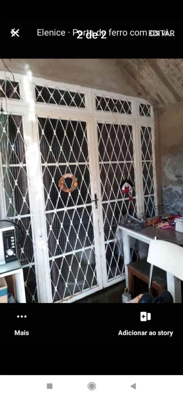 Porta de ferro já com os vidros. Mede 2.06 de largura x 2.15 de altura. - Foto 2