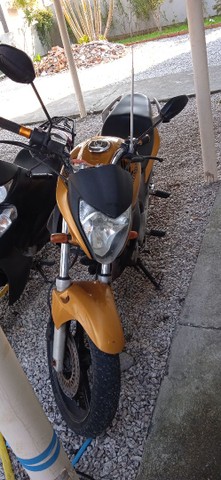 MOTO BEM CONSERVADA CABEÇOTE TUDO OK .