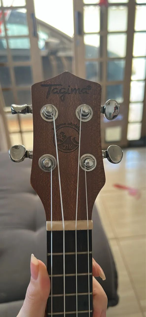 Ukulele tagima - Foto 4