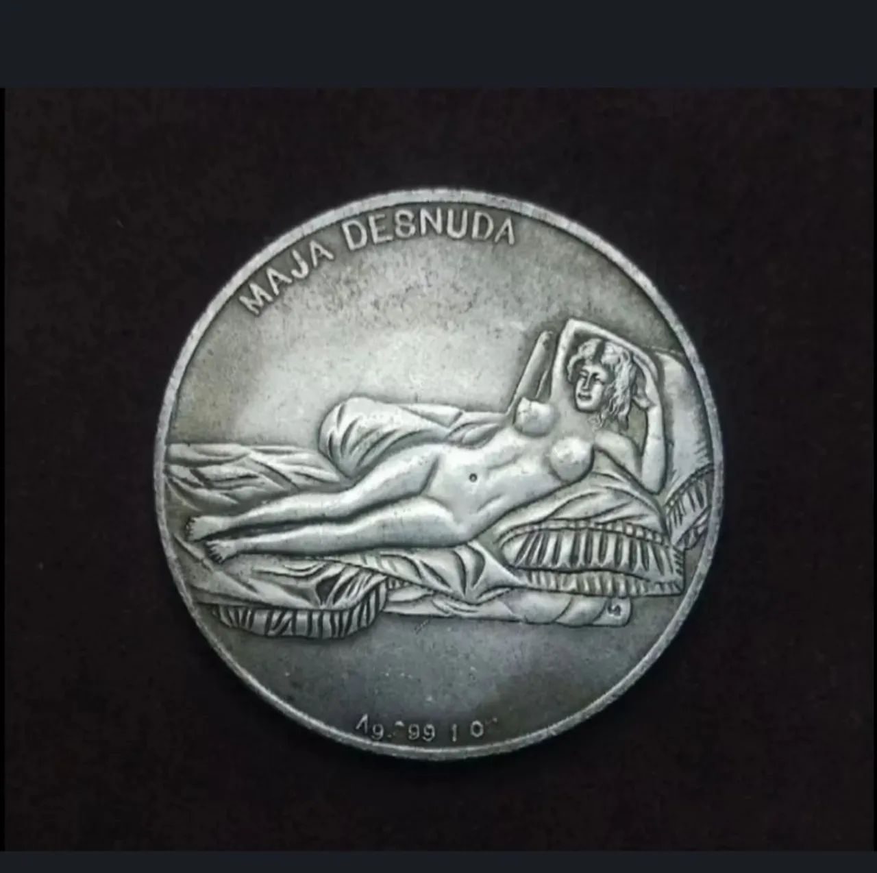 Moeda ou medalha de Leonardo da Vince e naja desnuda??