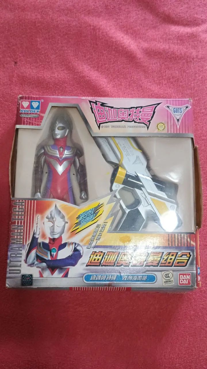 Boneco ultraman toga.