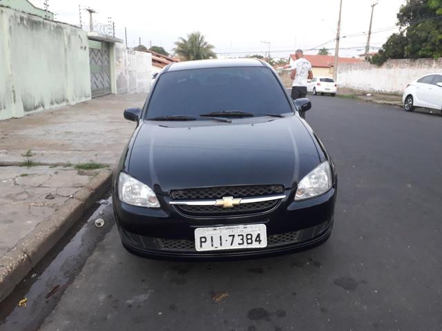 Vendo ou troco por carro de menor valor corsa classic 2015completo