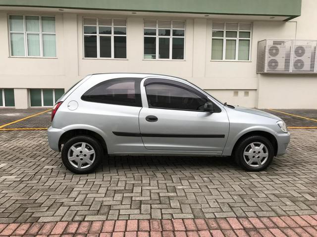 Chevrolet Celta com Ar-condicionado - Entrada + 390 por mês - Foto 7