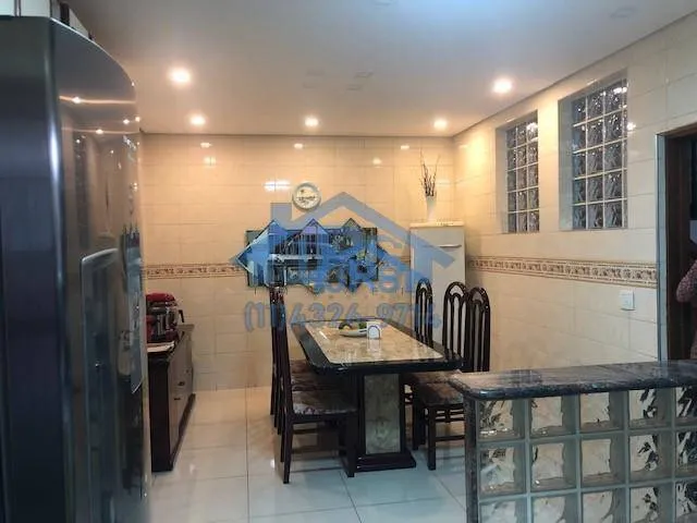 Sobrado com 3 dormitórios à venda, 125 m² por R$ 900.000,00 - Vila Pouso Alegre - Barueri/