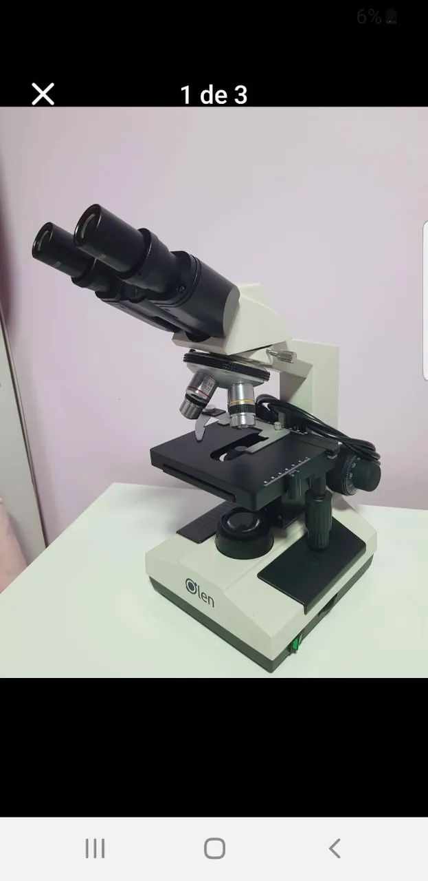 Microscópio óptico binocular 