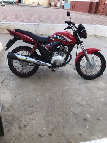 MOTO FAN 150.  ATRASADA 