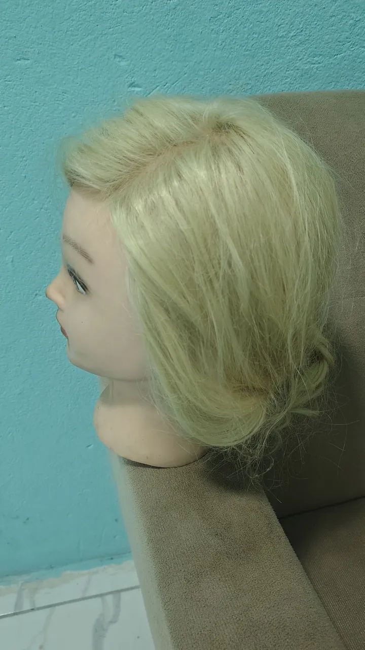 Cabeça de boneca para penteados