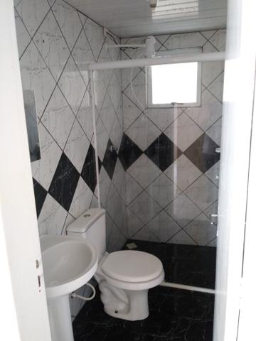 Casa no pinheirinho na parte de cima