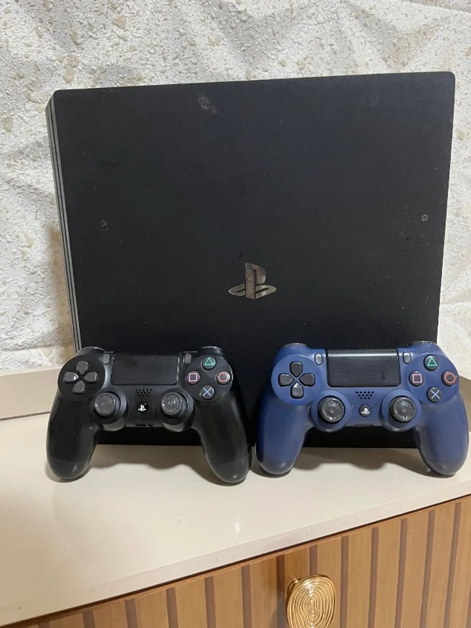 Ps4 pro e Headset - Peças e Acessórios de Vídeo Game - Boa Vista