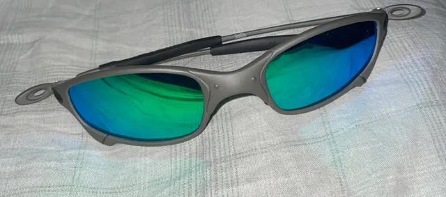 ÓCULOS DE SOL OAKLEY JULIET - LENTE AZUL DARK BLUE ARMAÇÃO CINZA