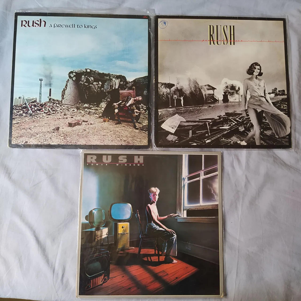 Discos de Vinil Rush - A farewell to kings, Permanente waves,Power windows R$ 140,00 cada.