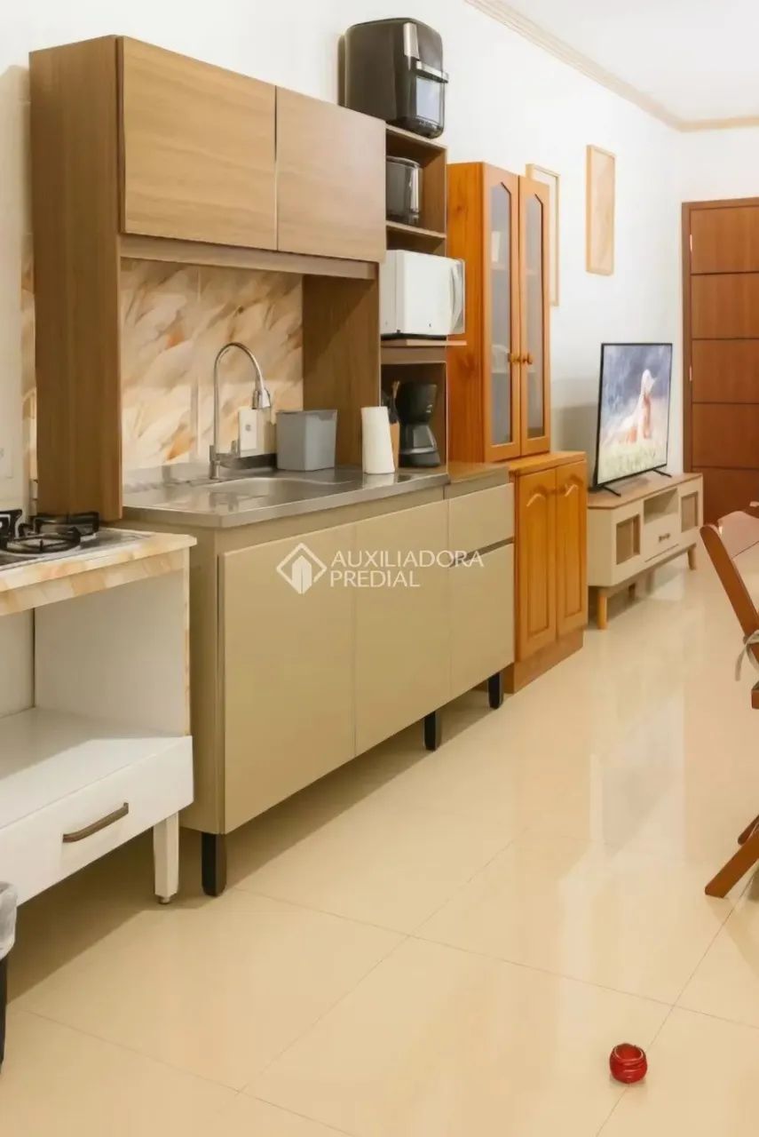 Auxiliadora Predial aluga, apartamento de 2 dormitórios, sendo uma suite, localização priv - Foto 4