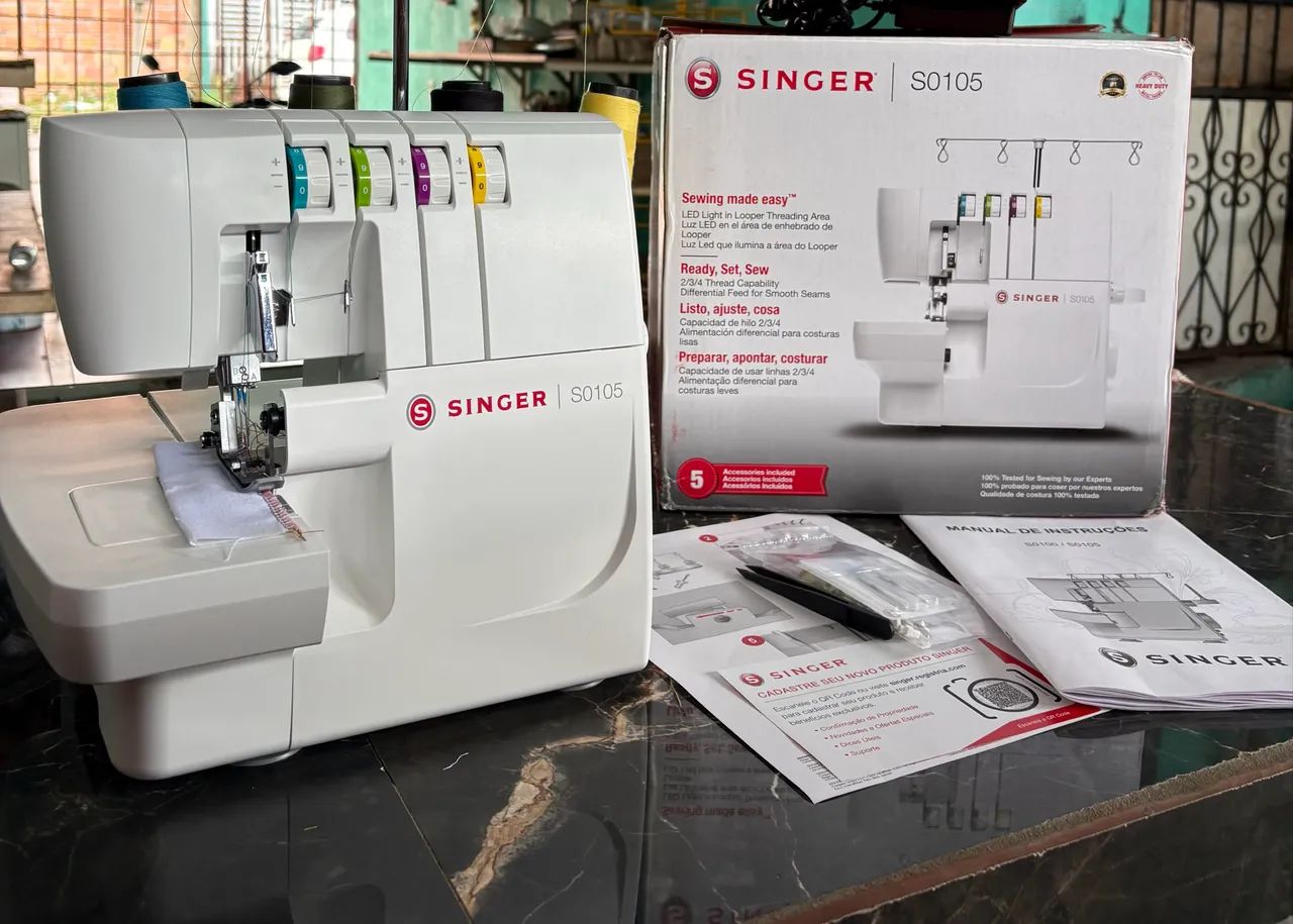 Máquina de costura singer