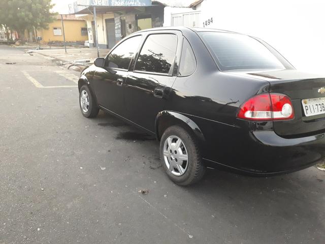 Vendo ou troco por carro de menor valor corsa classic 2015completo - Foto 5