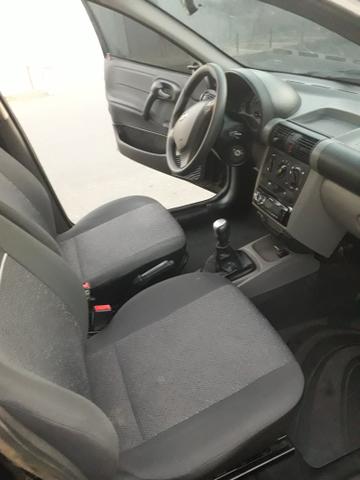 Vendo ou troco por carro de menor valor corsa classic 2015completo - Foto 9