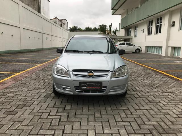 Chevrolet Celta com Ar-condicionado - Entrada + 390 por mês - Foto 2