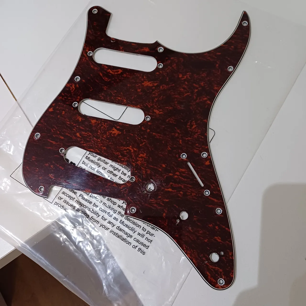 Escudo (pickguard) para guitarra