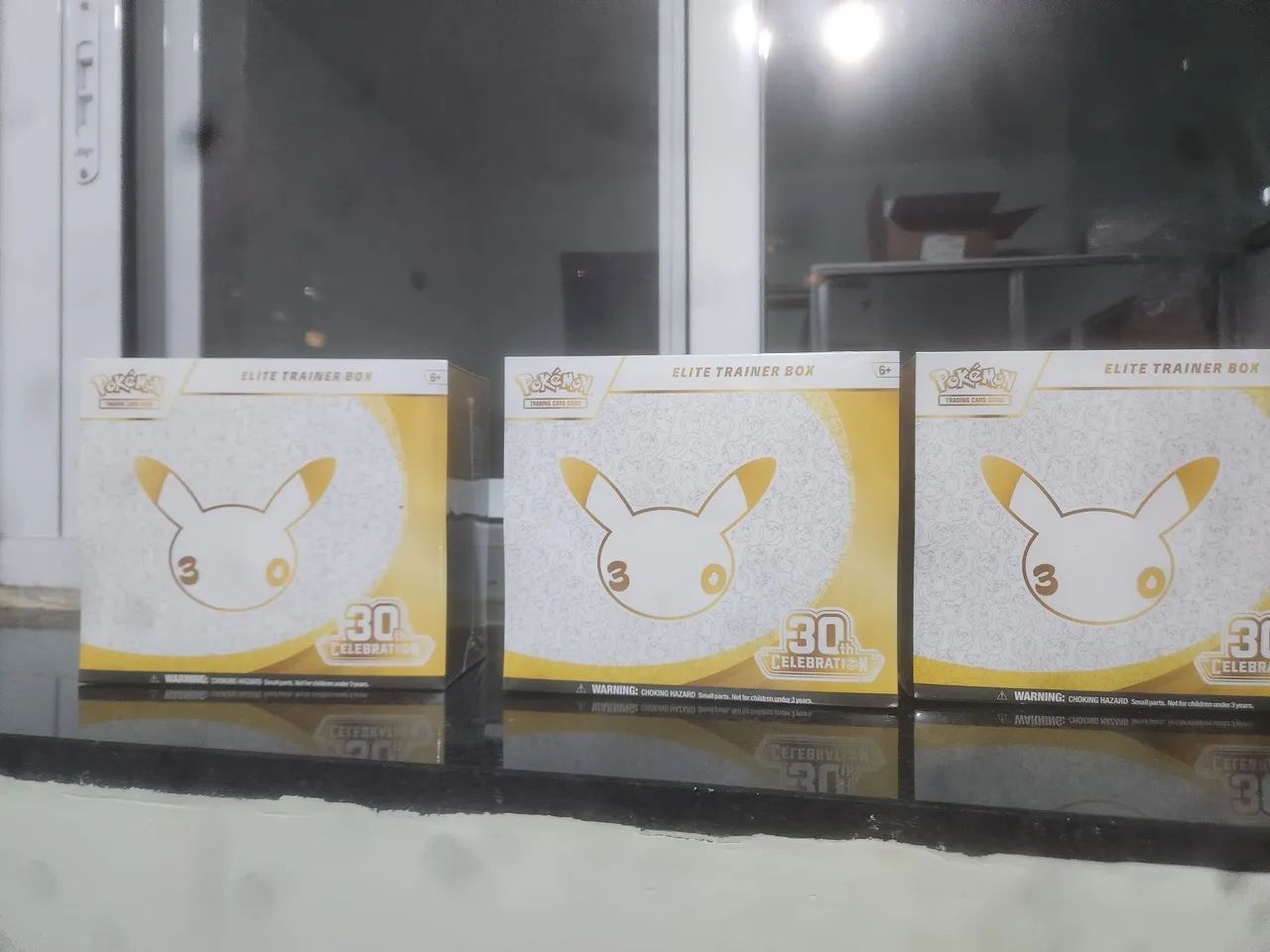Elite trainer box 30 anos Ingles