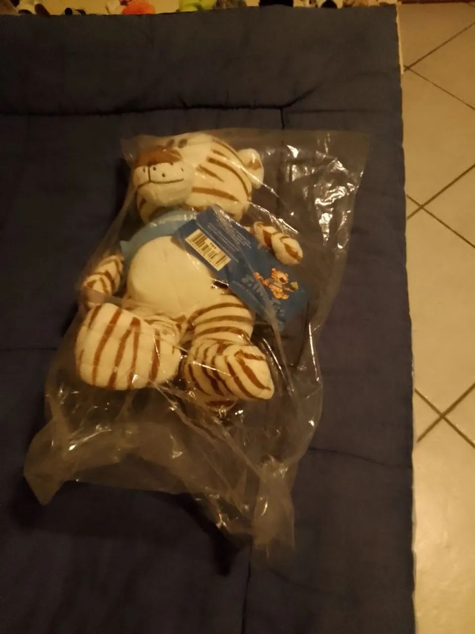 Urso pelúcia Nestle.