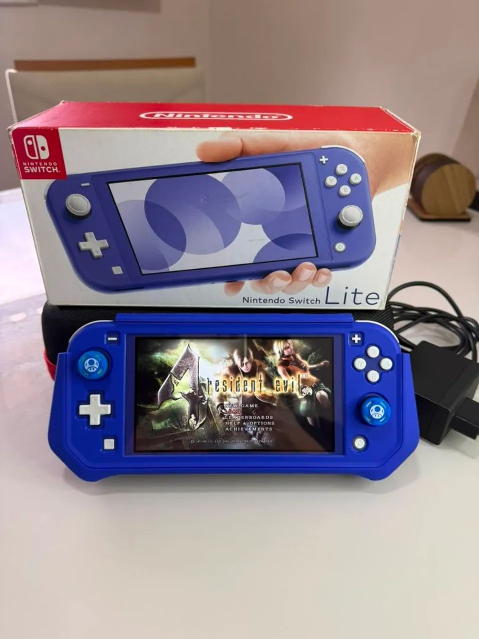 Nintendo Switch Lite Azul + 128GB - Foto 2