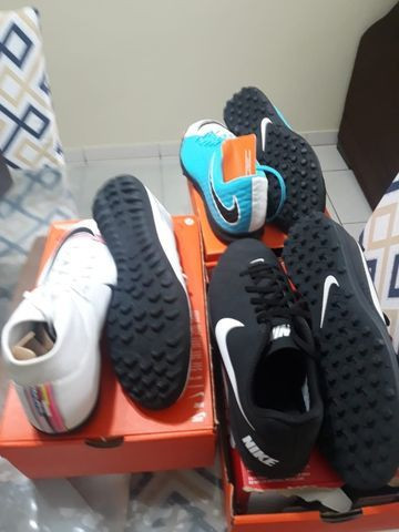 chuteira society nike ou adidas