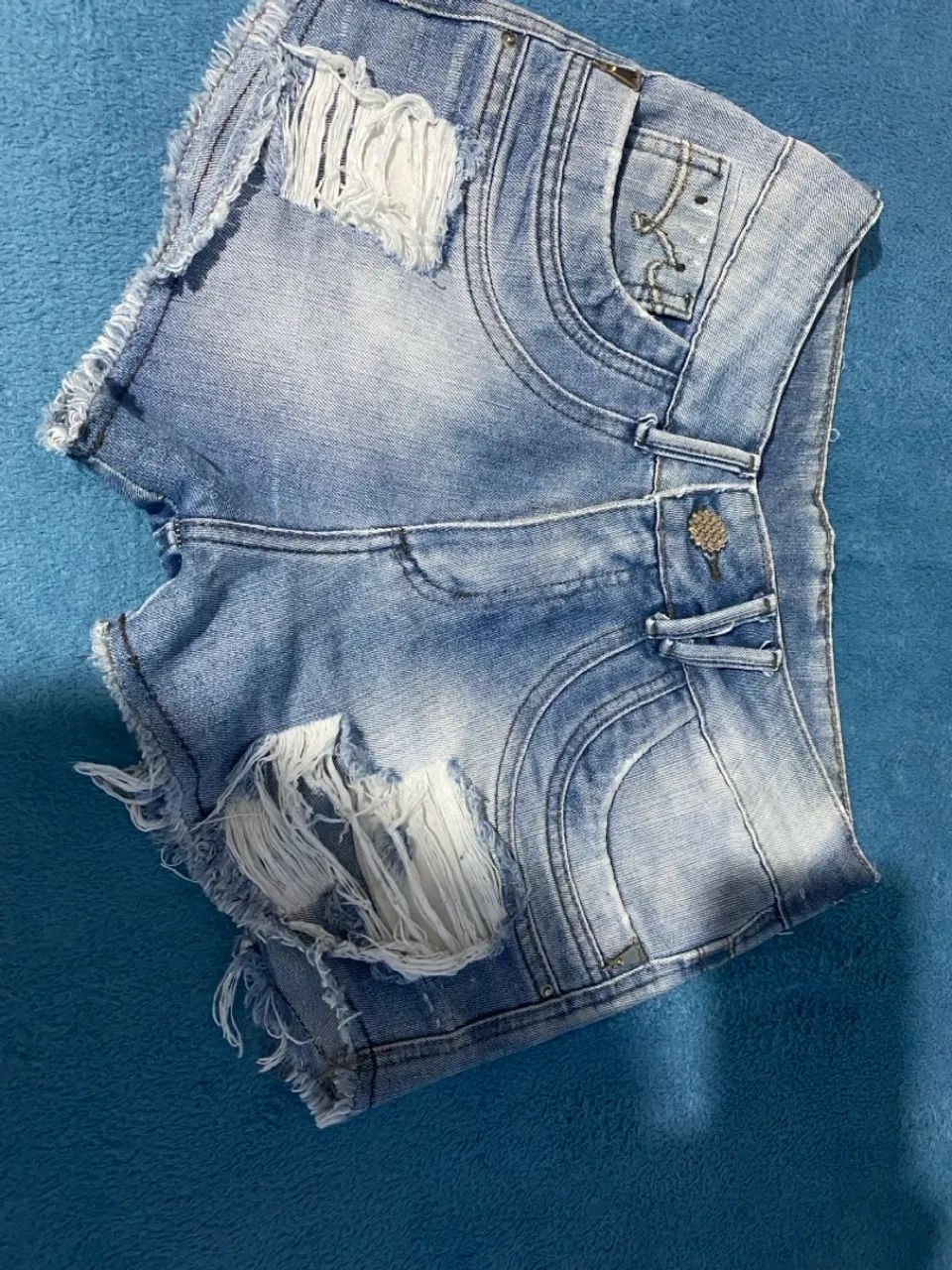 Três shorts jeans