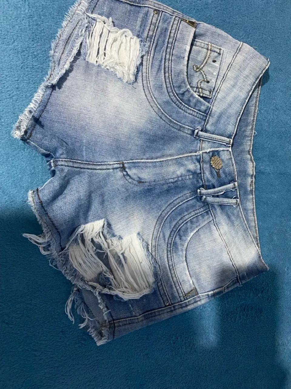 Três shorts jeans