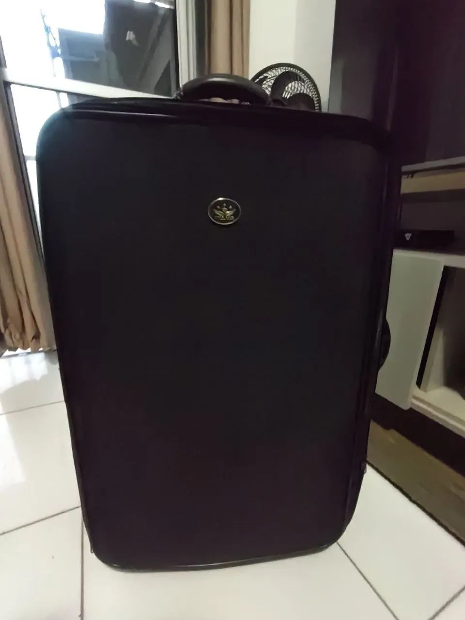 Mala 32kg em tecido na cor preta- R$125