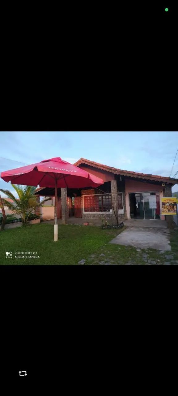 Casa de frente pro mar com edícula 