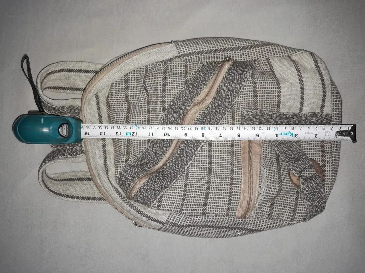Mochila de tecido bege e marrom - Foto 3