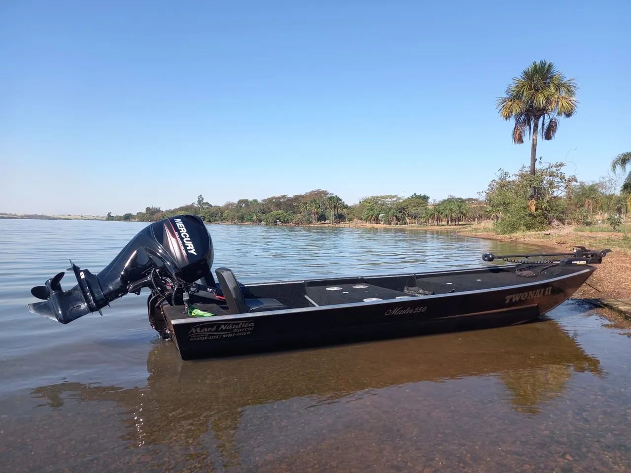 Barco master 5.5, motor mercury 60hp com trim no manche