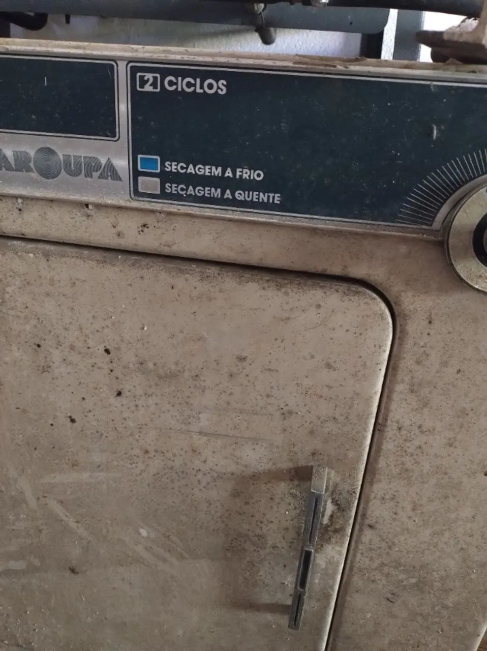 Secadora antiga funcionando 