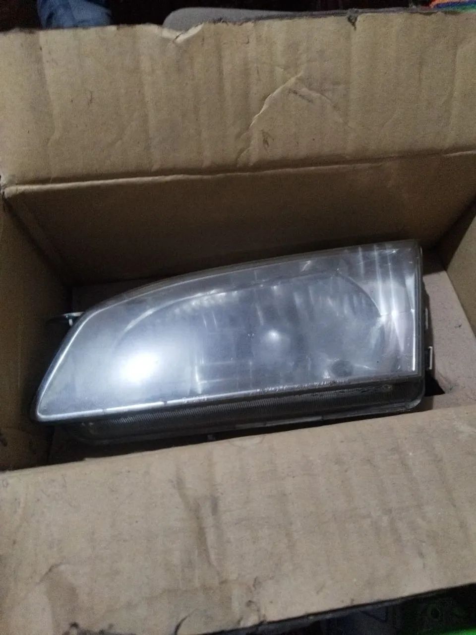 Farol do Toyota Corolla 2001