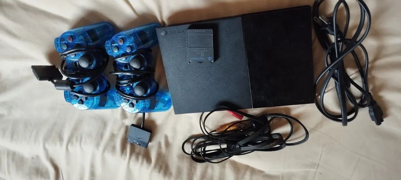 PS2 - Com chipset matrix original e leitor de disco em perfeito estado.