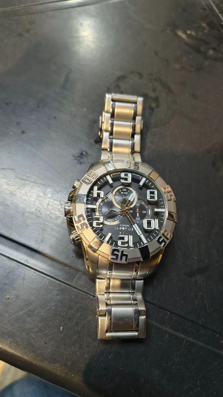 Vendo relógio thechnos 100% funcional algumas marcas de uso original 