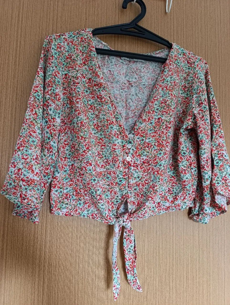 Blusa de manga 