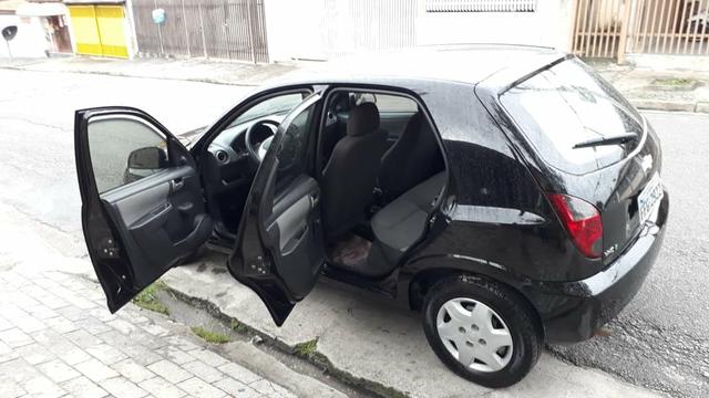 Vendo Celta Spirit/LT 1.0 - Flex 4 portas ano 2012 - Único dono - Foto 3