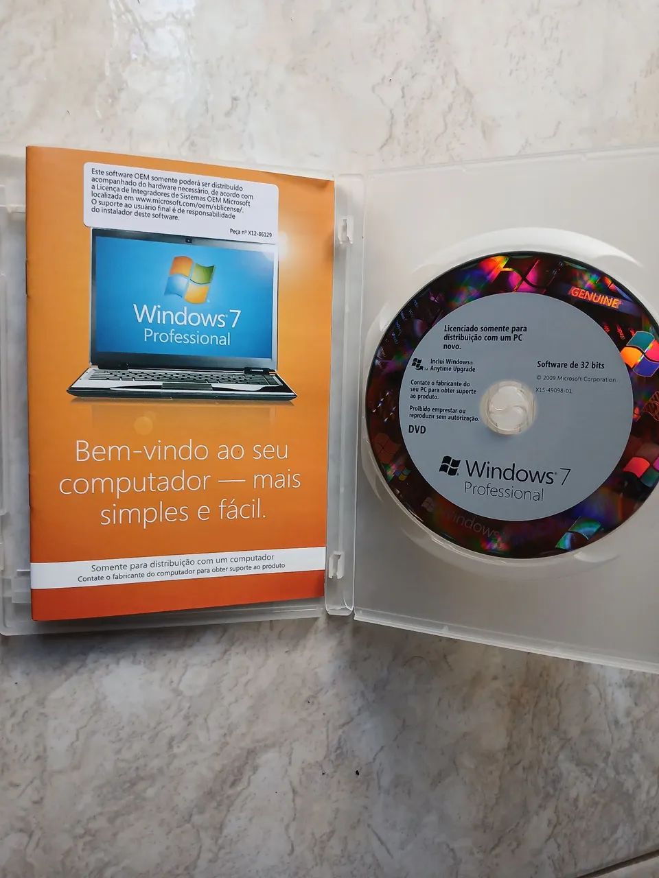 DVD original Windows 7 Professional 32 bits. 2 DVDs