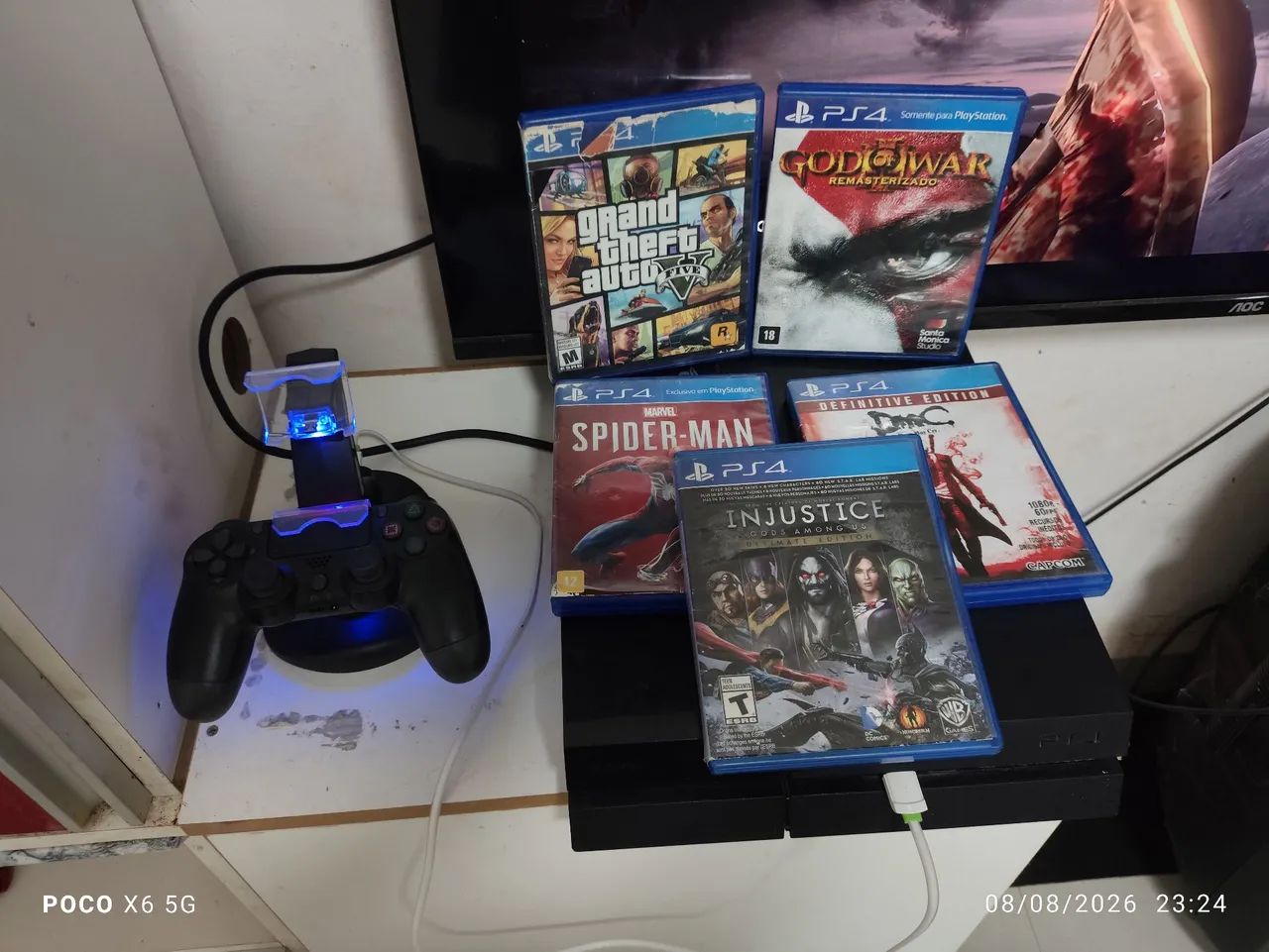 Ps4 1tb com cinco jogos e base de carregamento  - Foto 2
