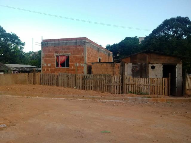 Lote com casa