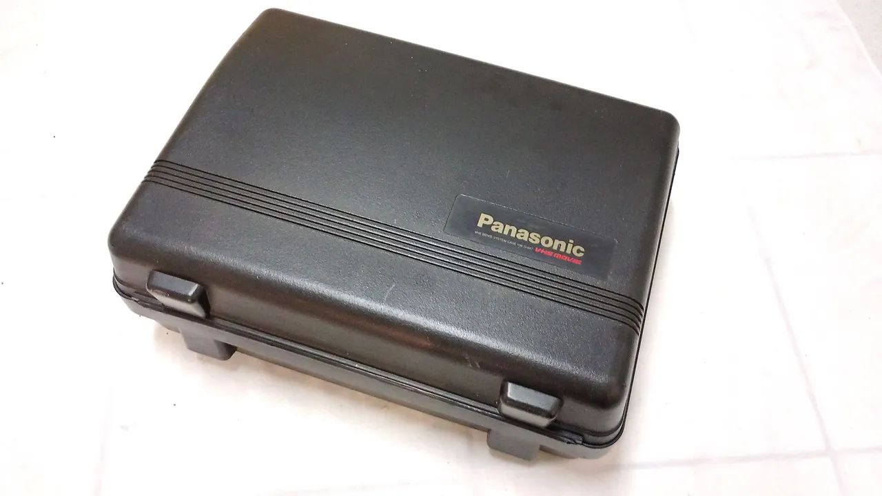 Filmadora VHS Panasonic caixa e tripé  - Foto 5