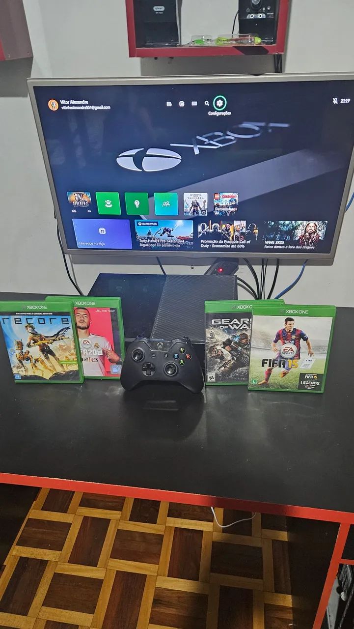 Xbox One com jogos e controle