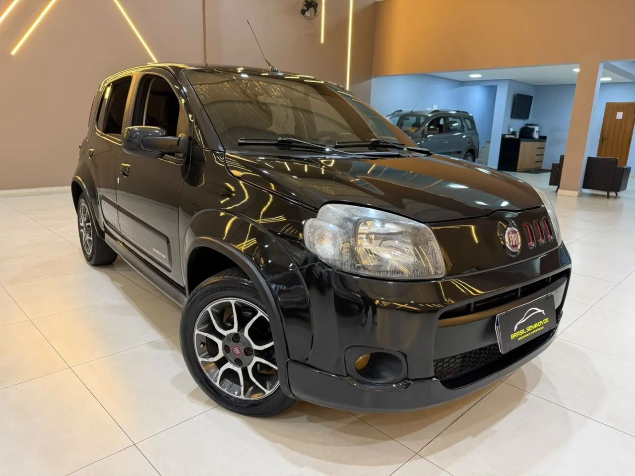 Fiat Uno Sporting 1.4 EVO Fire Flex 8V 4P 2013 - Foto 2