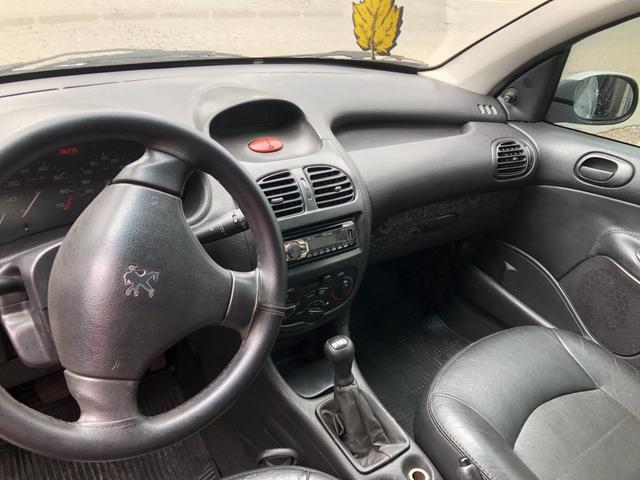 Peugeot 206 1.4 completo troca/financia - Foto 4