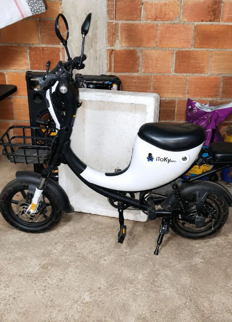 Bicicleta elétrica + Par de capacetes - Foto 2