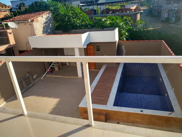 Linda casa com piscina e duas vagas de garagem - Foto 19