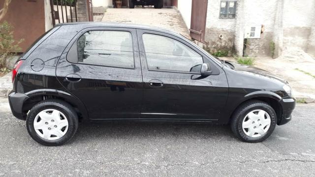 Vendo Celta Spirit/LT 1.0 - Flex 4 portas ano 2012 - Único dono - Foto 12