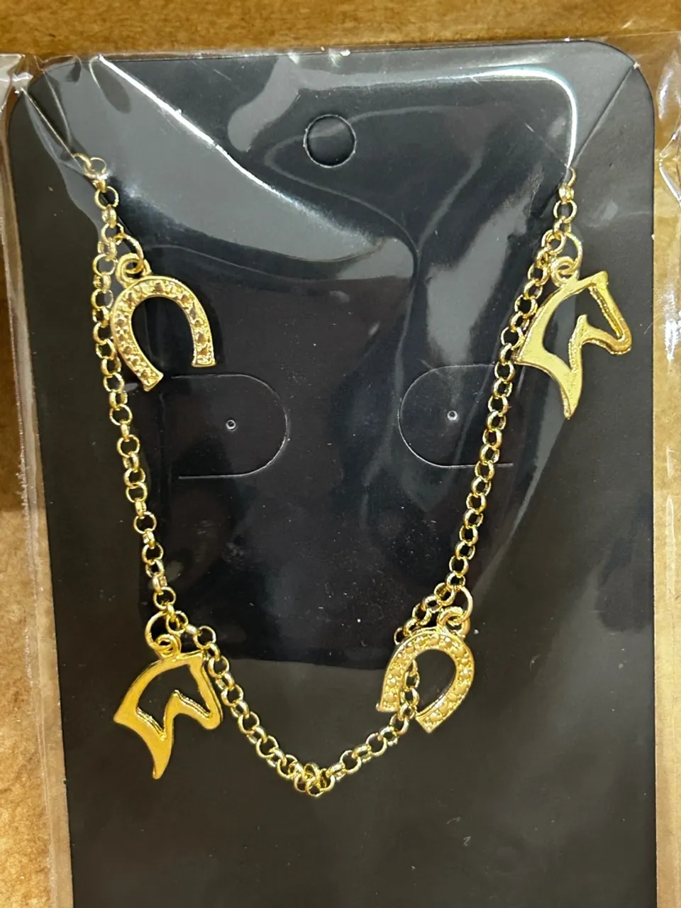 Pulseira de Cavalos e Ferraduras.