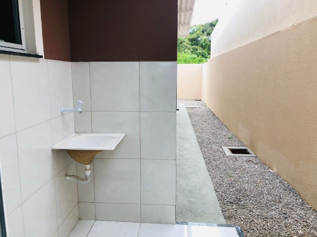 WS casa nova com 3 quartos,2 banheiros,coz.americana,quintal com otima localização - Foto 13